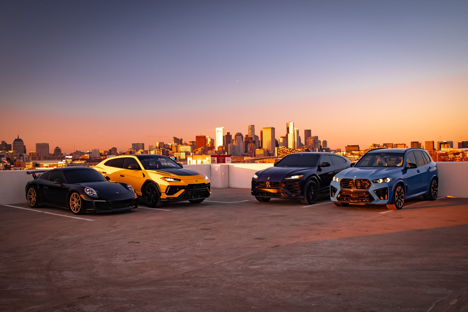 Supreme Rentals cars and SUVs outside the Manchester location